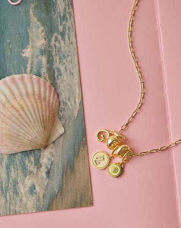 gold personalized charms on a chain necklace