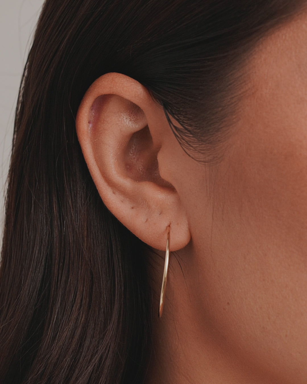 Woman wearing Classic Gold Hoop || option::14K Solid Gold, 30mm